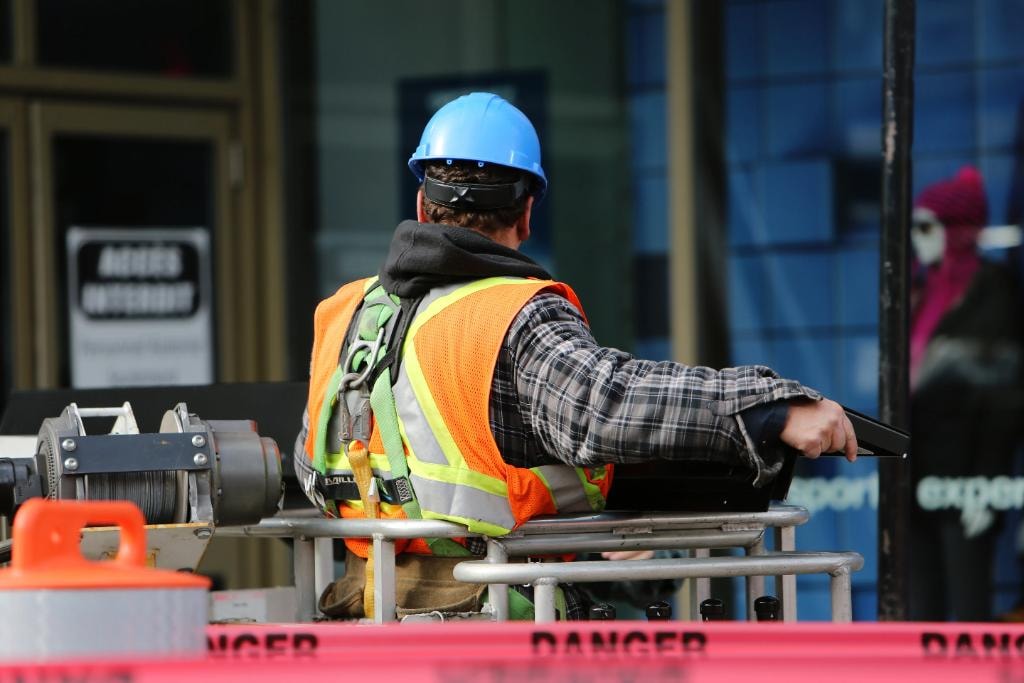 Industrial worker in high-visibility safety gear